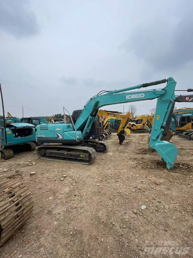 Kobelco SK140 Beltegraver