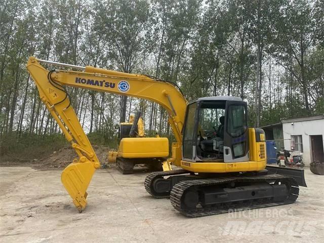 Komatsu PC128US Beltegraver