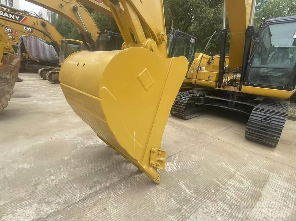 CAT 2021 CAT 323Gx Hjulgravere