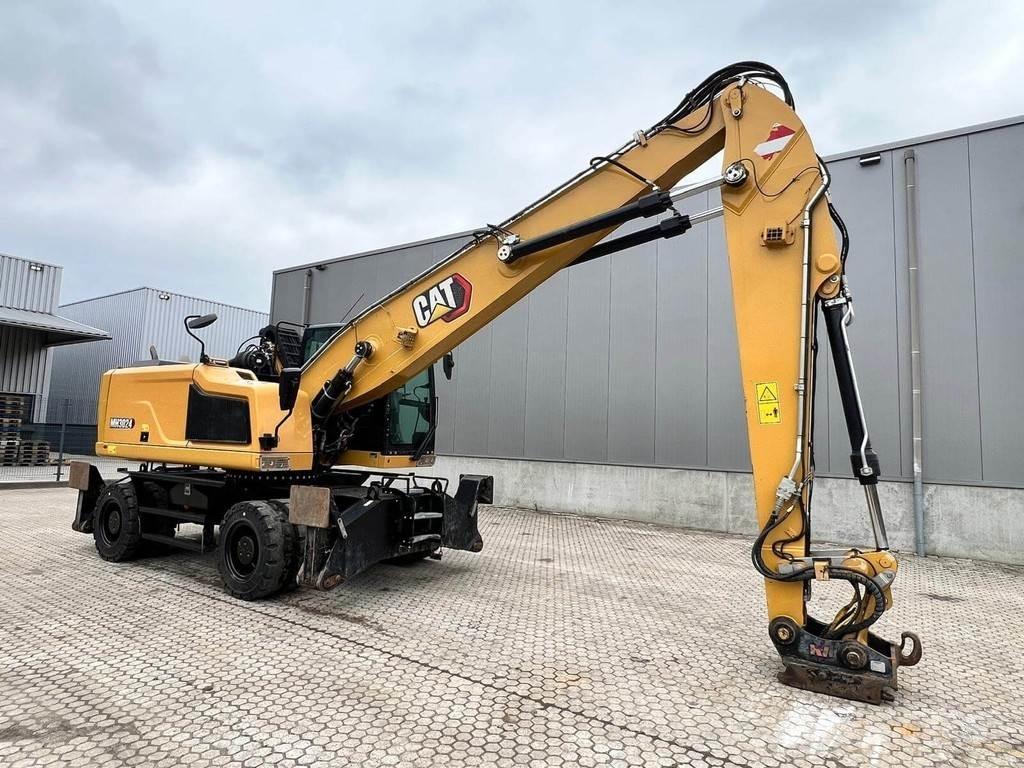 CAT MH3024-06C Gravemaskiner for avfallshåndtering