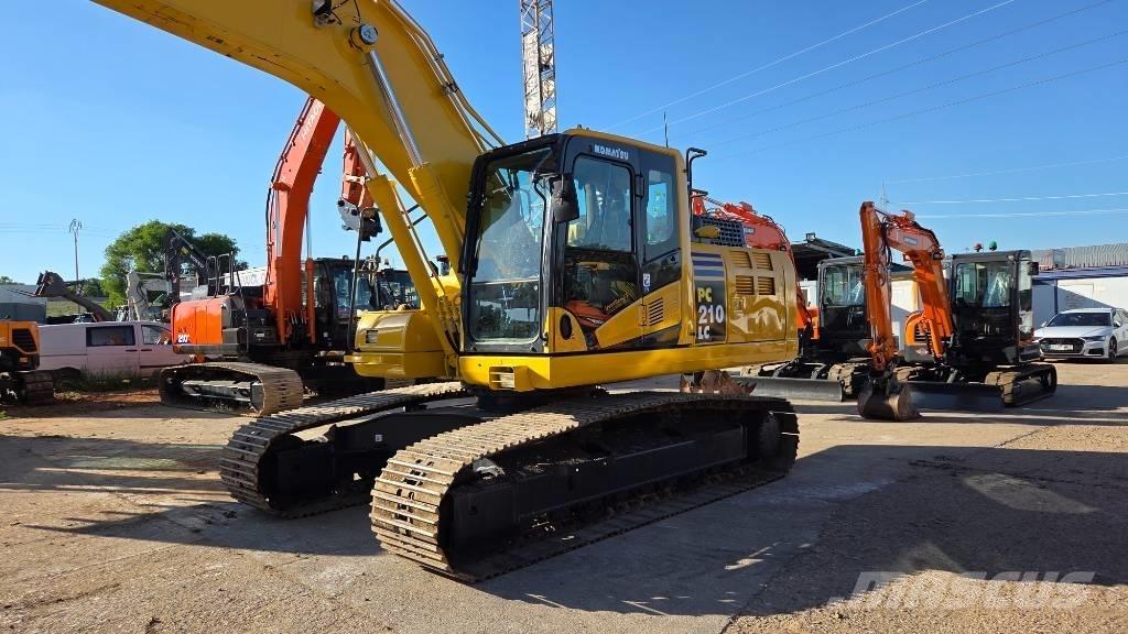 Komatsu PC 210 Beltegraver