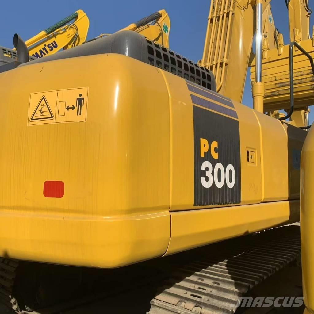 Komatsu PC 300-7 Beltegraver