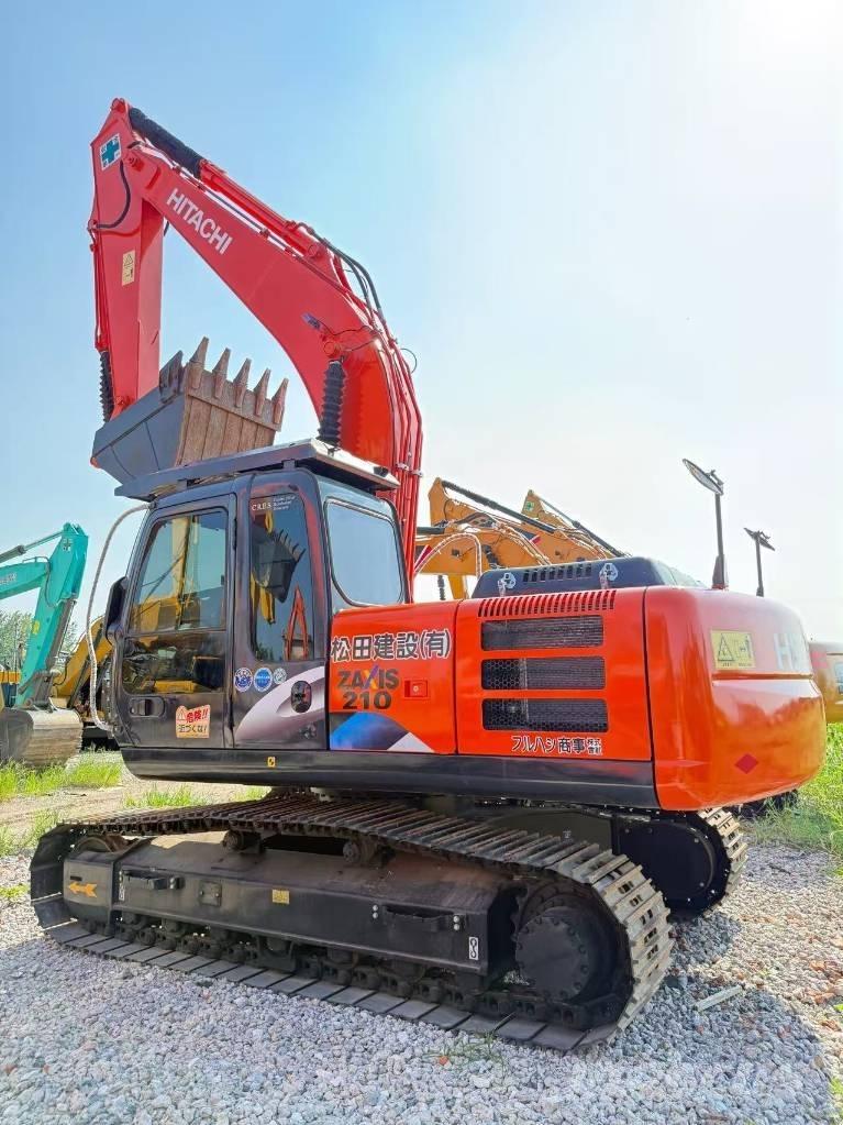 Hitachi ZX 210 Beltegraver