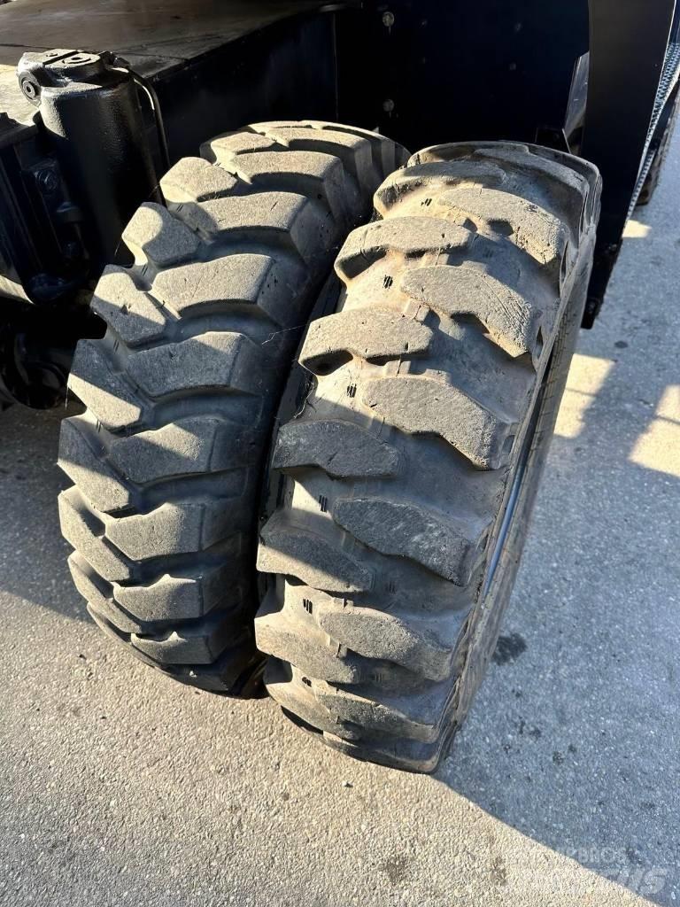 CAT M 318 F Hjulgravere