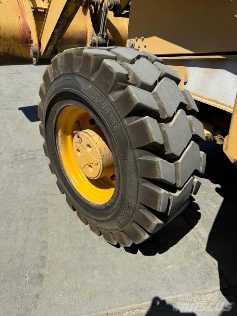 John Deere 310 G Traktorgravere