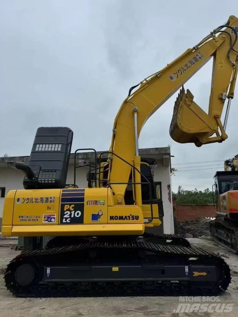 Komatsu 210LC-8 Beltegraver