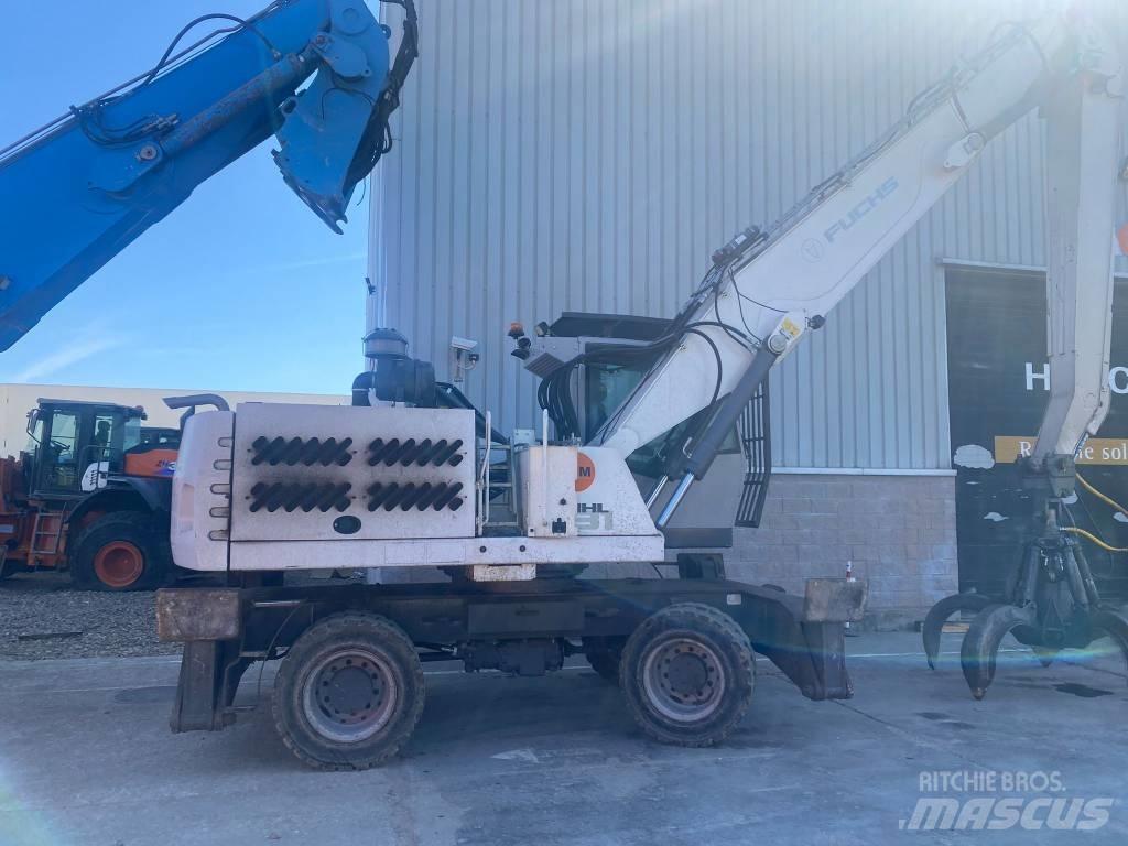 Fuchs MHL 331 Gravemaskiner for avfallshåndtering