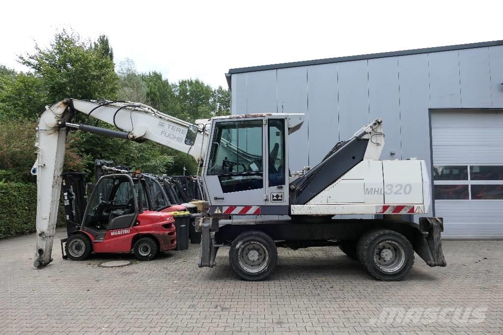 Fuchs MHL 320 Gravemaskiner for avfallshåndtering