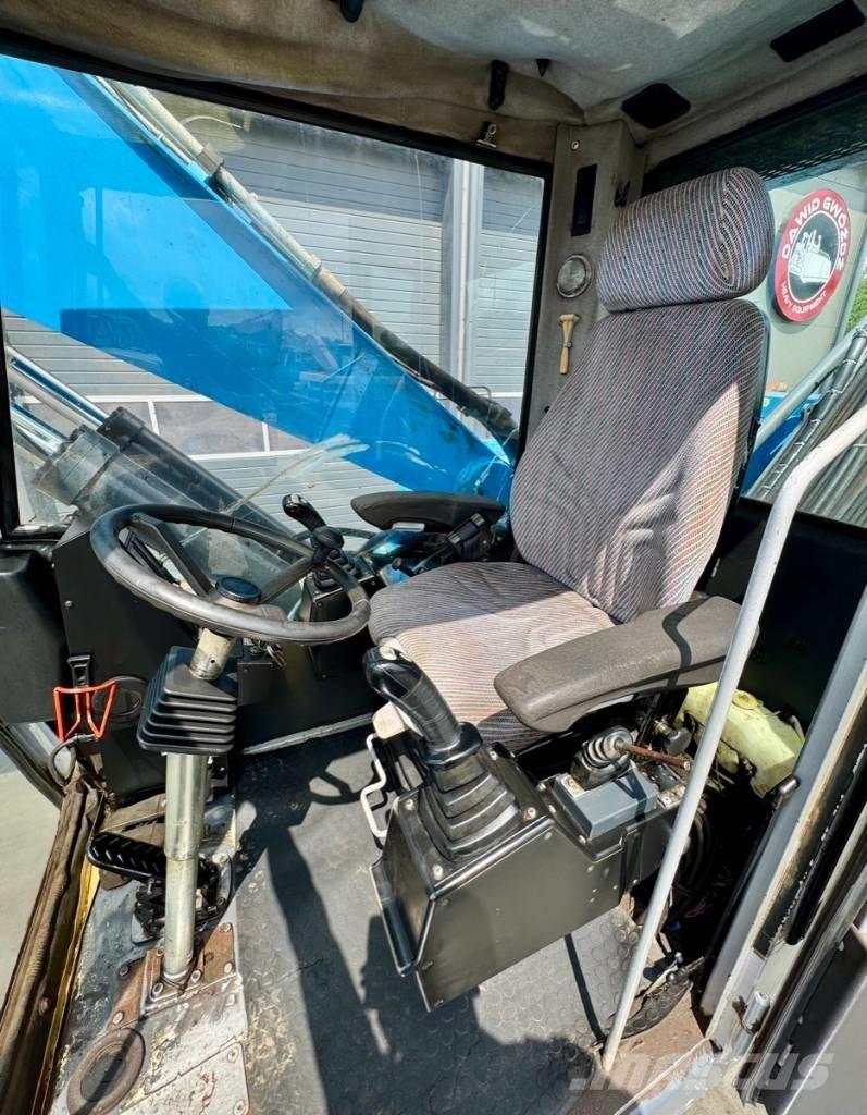 Fuchs MHL 331 Gravemaskiner for avfallshåndtering