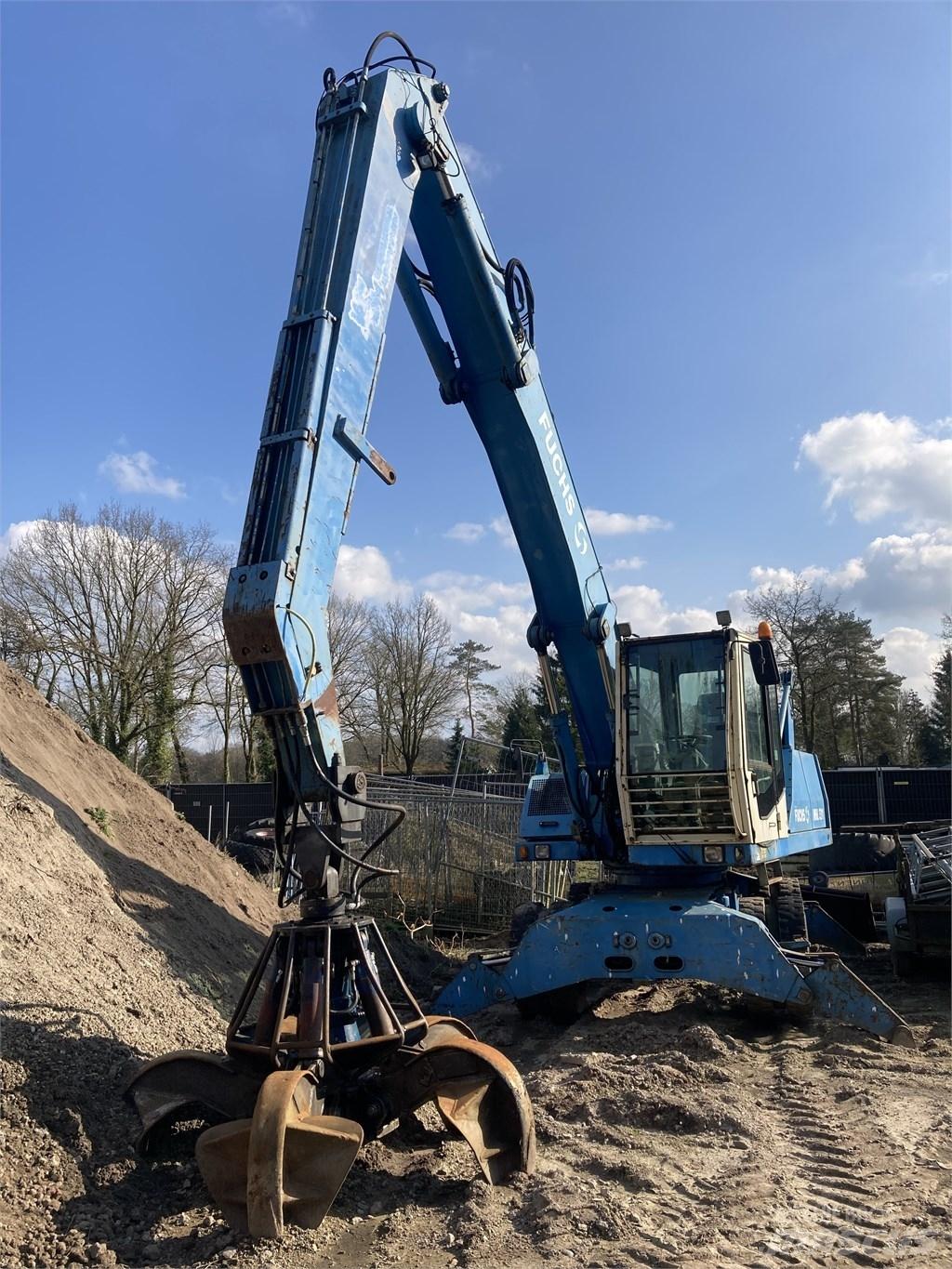 Fuchs MHL 331 Gravemaskiner for avfallshåndtering