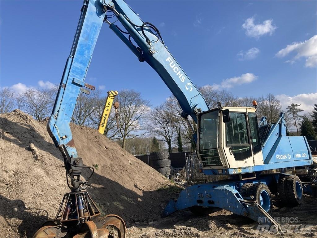 Fuchs MHL 331 Gravemaskiner for avfallshåndtering