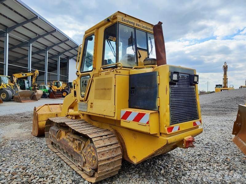 CAT 943 Beltelastere