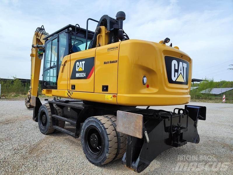 CAT MH3024 Gravemaskiner for avfallshåndtering