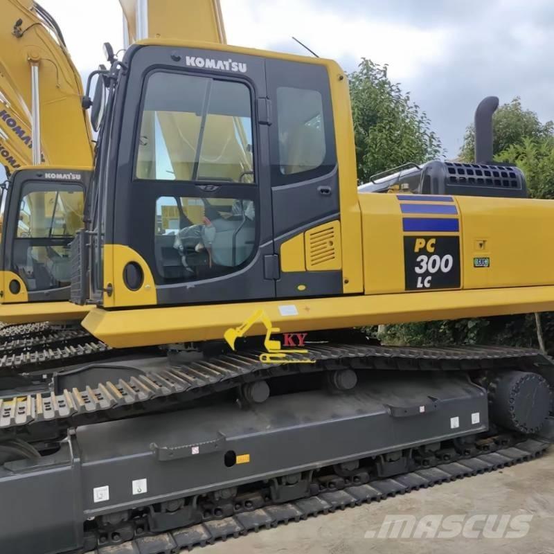 Komatsu PC 300-8 Beltegraver