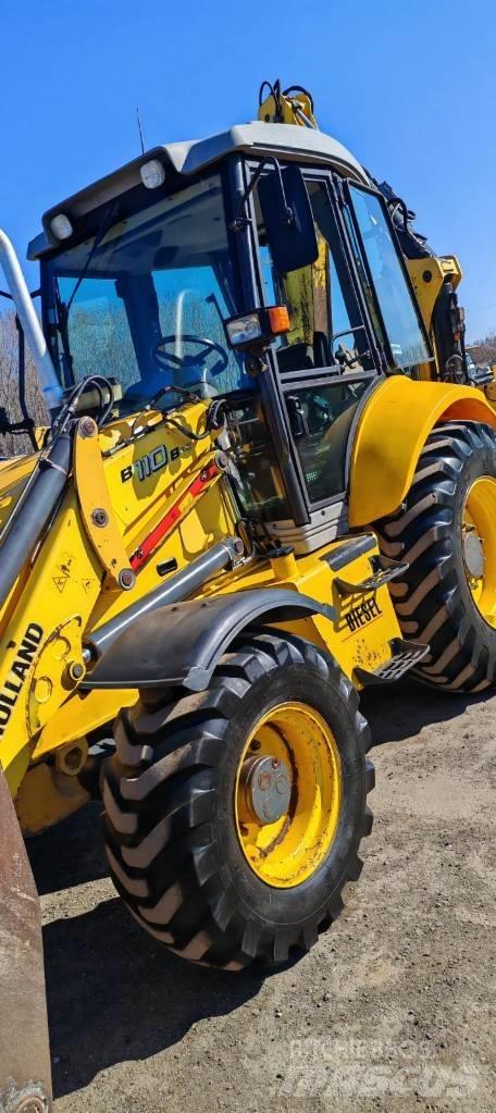 New Holland LB 110 B Traktorgravere