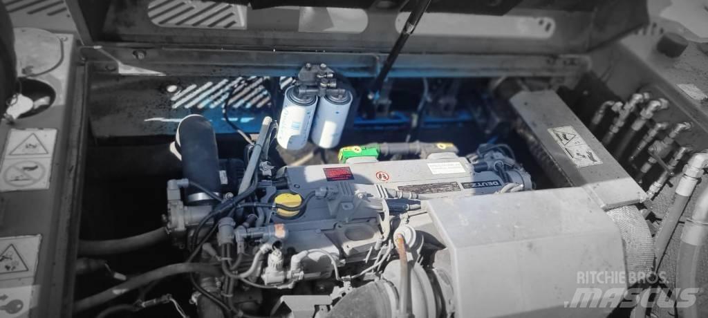 Fuchs MHL 355 Gravemaskiner for avfallshåndtering