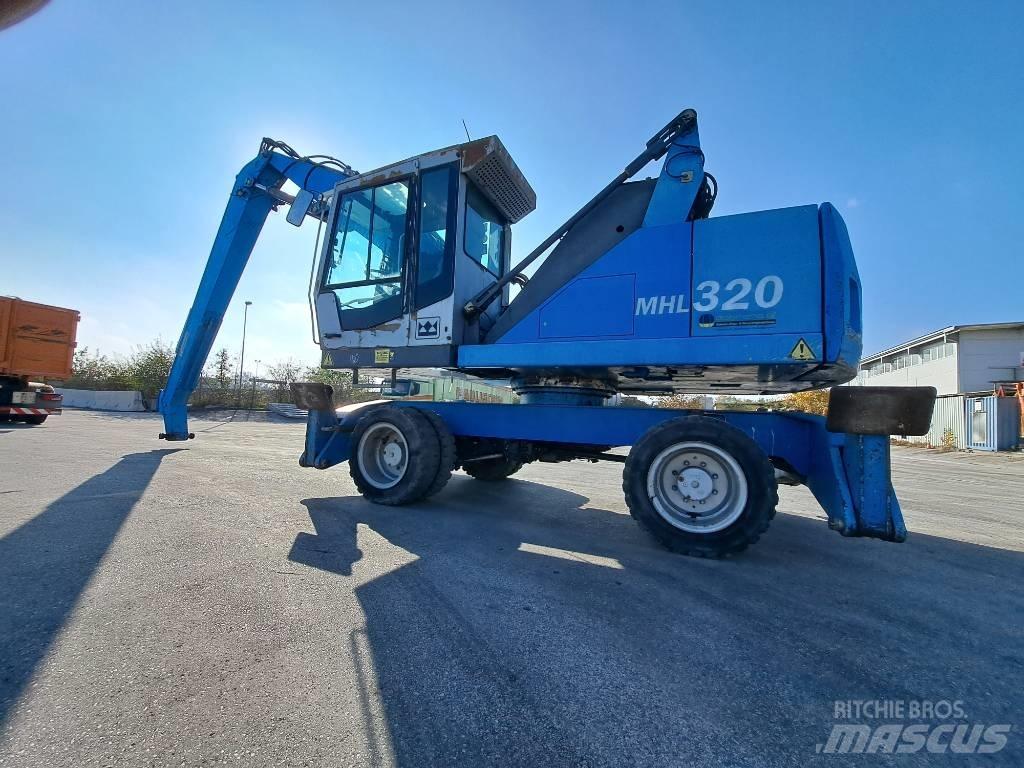 Fuchs MHL 320D Gravemaskiner for avfallshåndtering