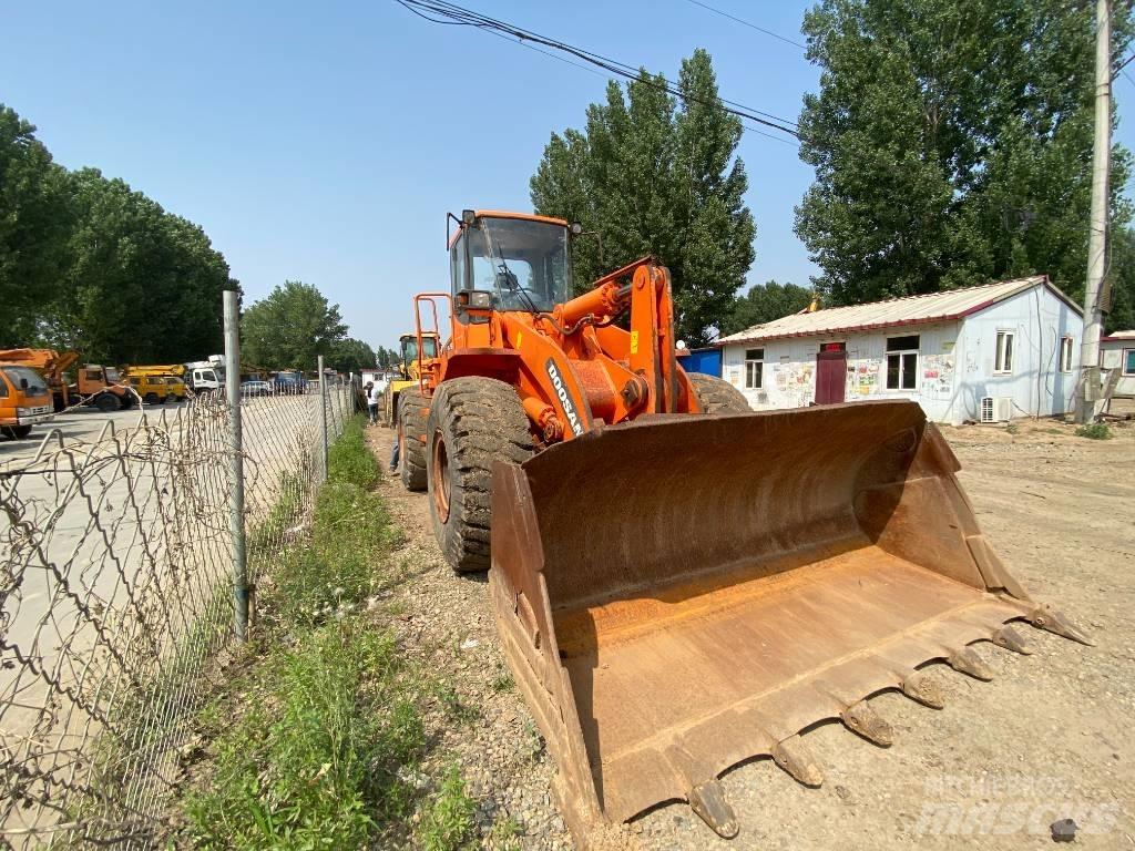 Doosan DL503 Traktorgravere