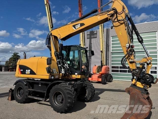 CAT M 313 D Hjulgravere