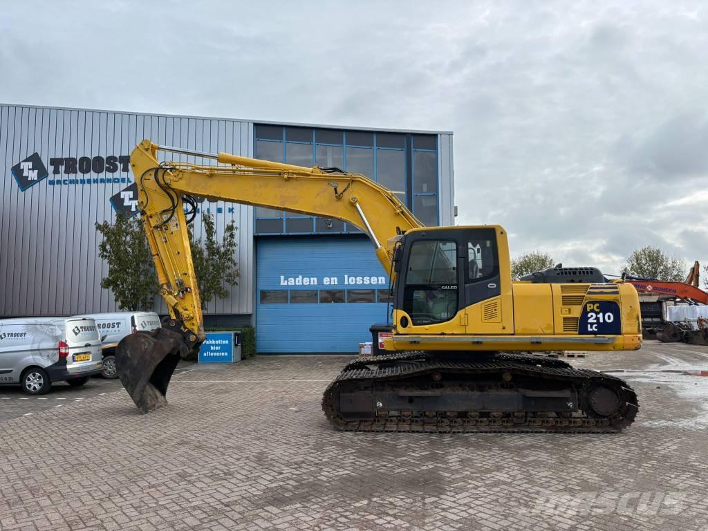 Komatsu PC 210 LC-8 Beltegraver