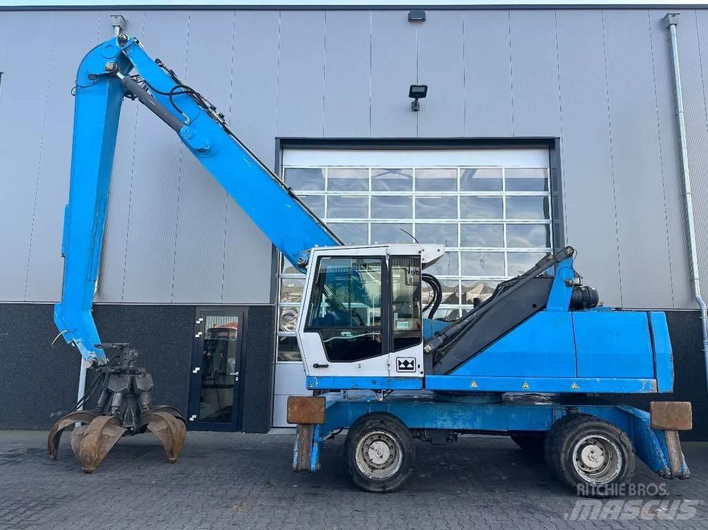 Fuchs MHL 340 Gravemaskiner for avfallshåndtering