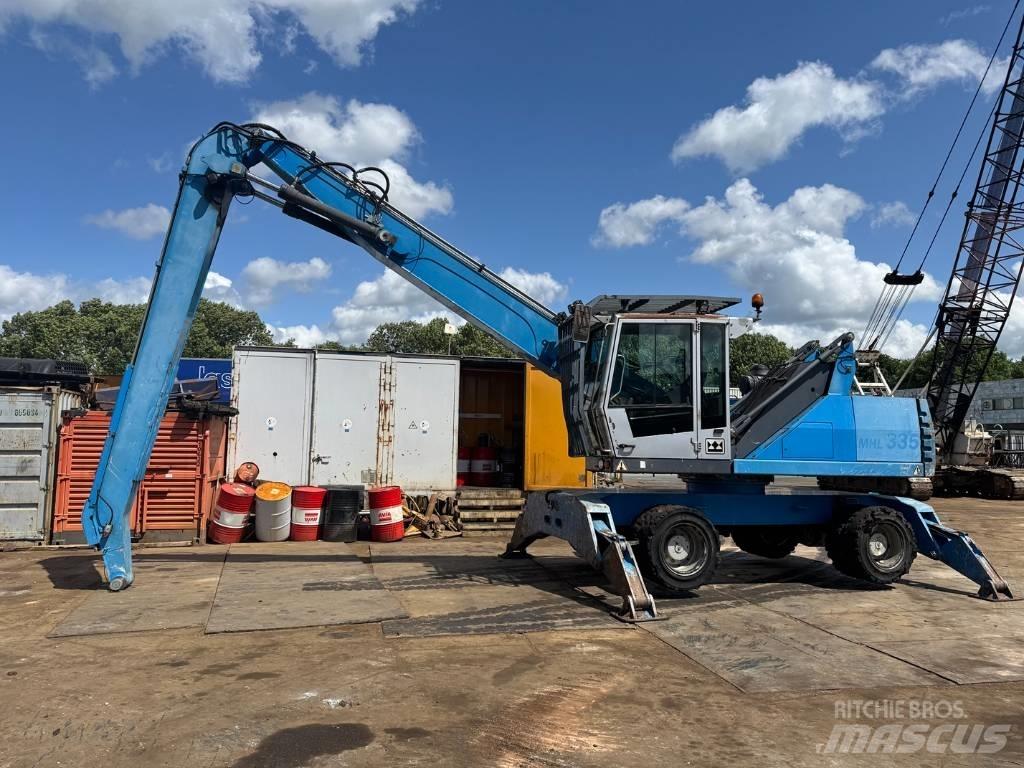 Fuchs MHL 335 Gravemaskiner for avfallshåndtering