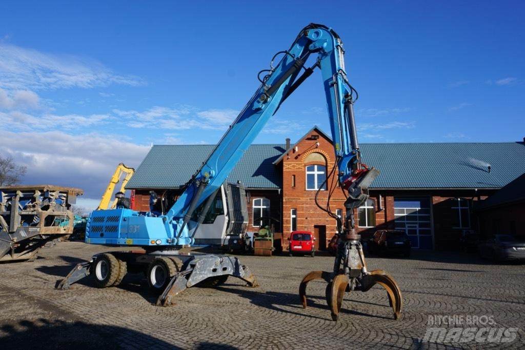Fuchs MHL 331 Gravemaskiner for avfallshåndtering