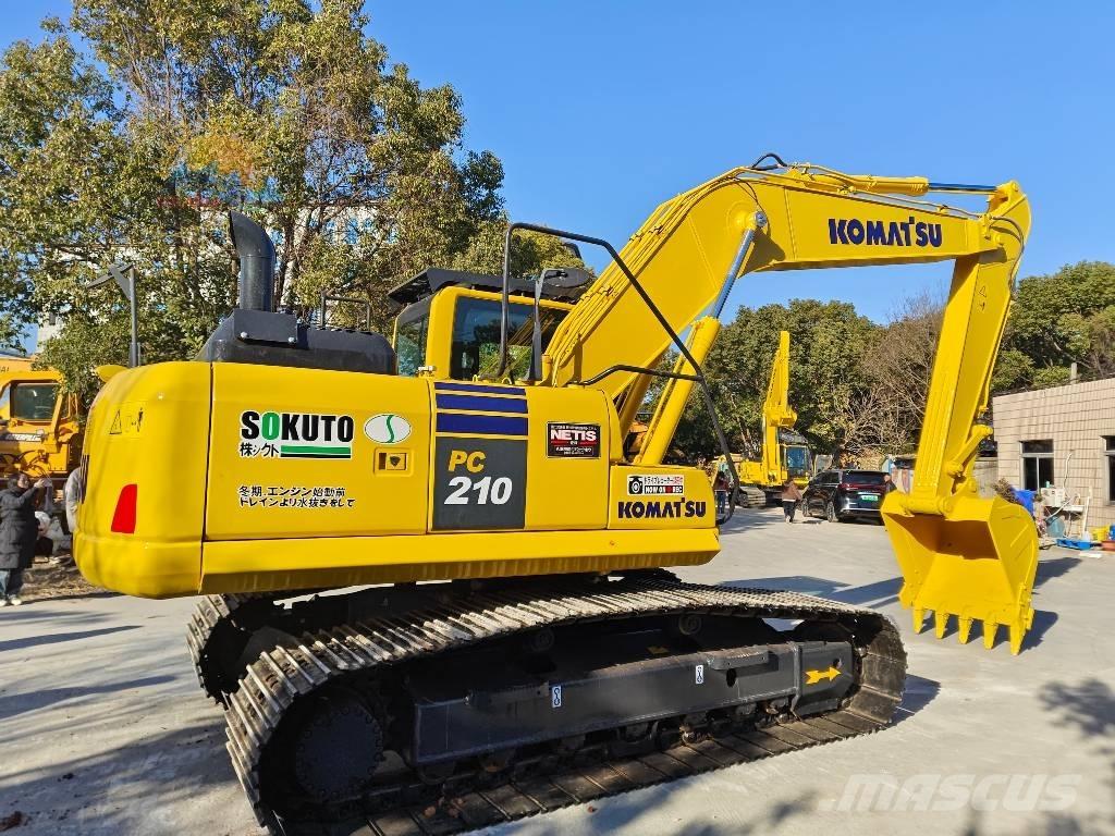 Komatsu PC 210-8 Beltegraver