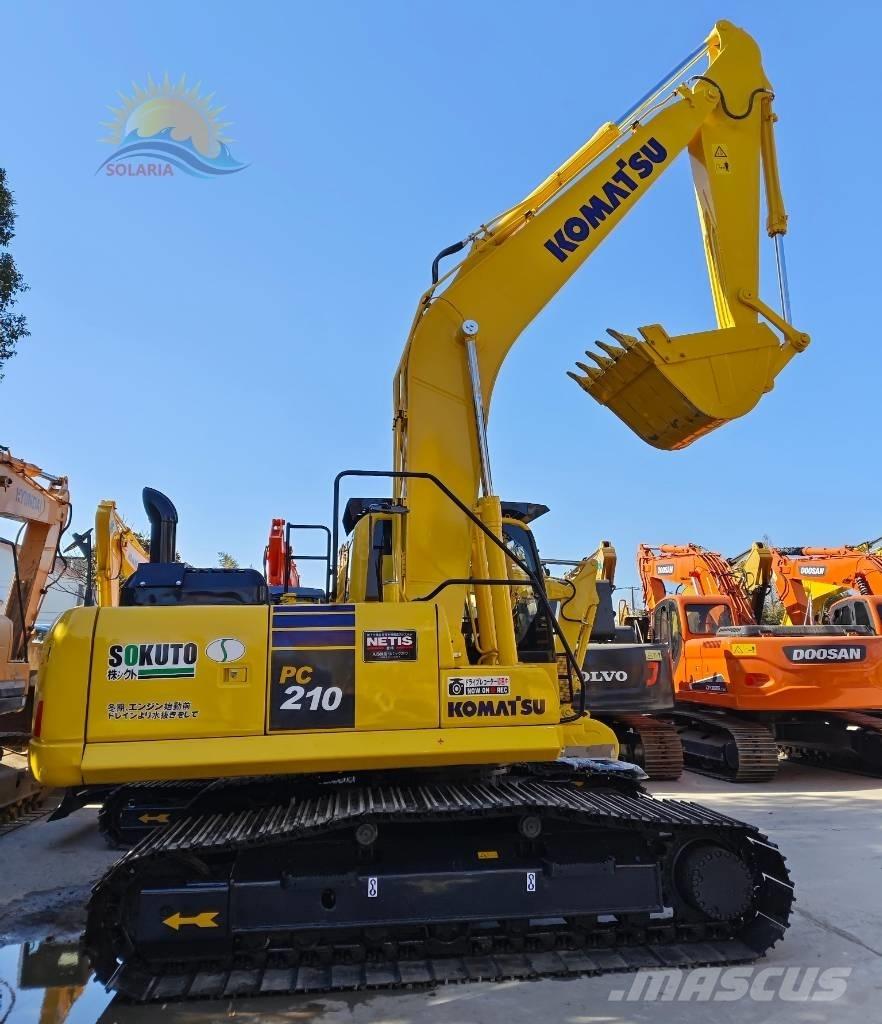 Komatsu PC 210-8 Beltegraver