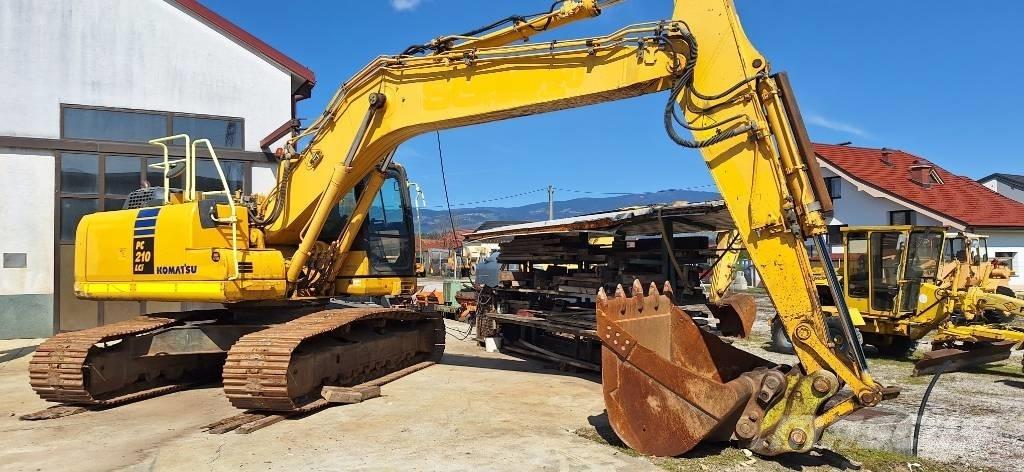 Komatsu PC 210 Beltegraver