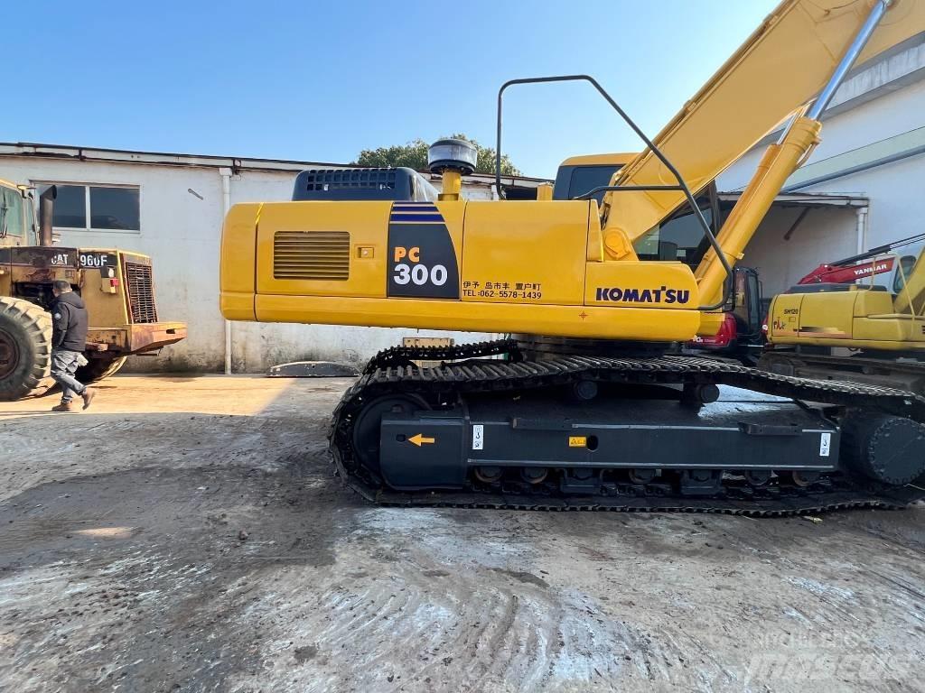 Komatsu PC300-7 Beltegraver