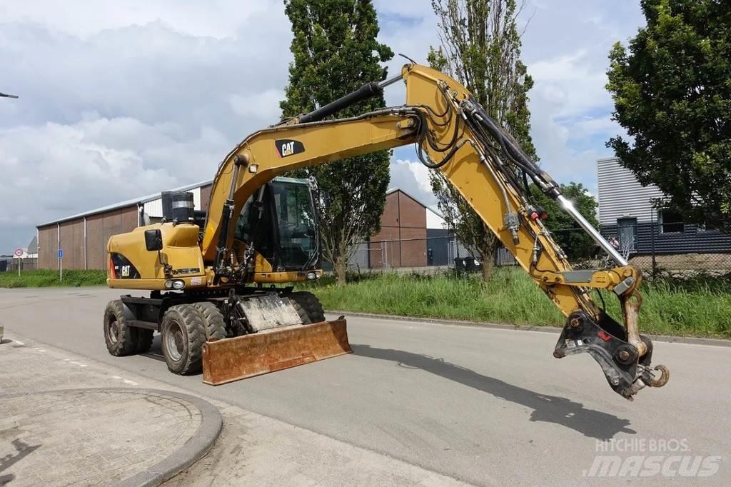 CAT M313 D Hjulgravere