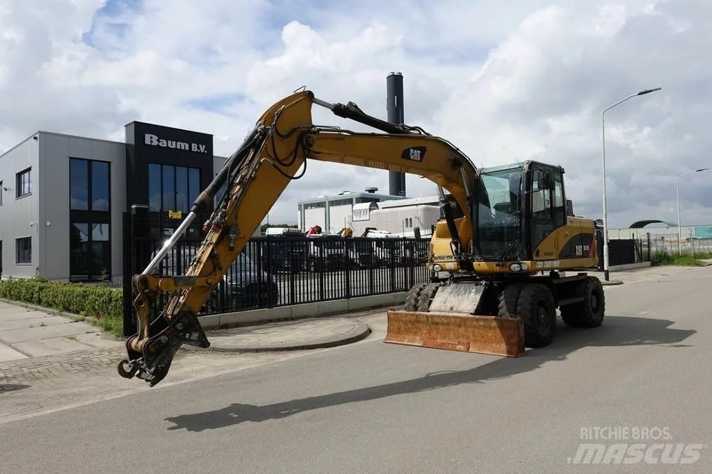 CAT M313 D Hjulgravere