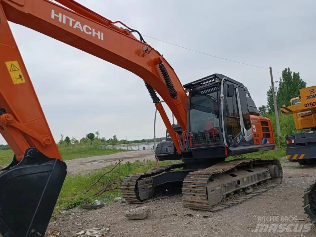 Hitachi ZX210 Beltegraver