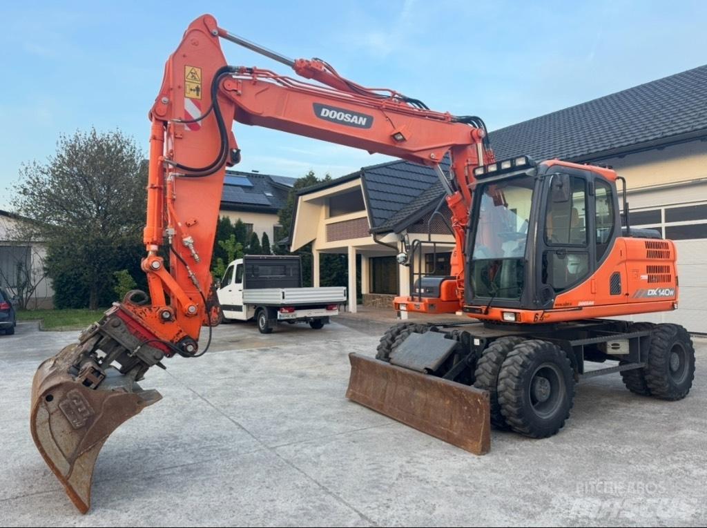 Doosan DX 140 W Hjulgravere