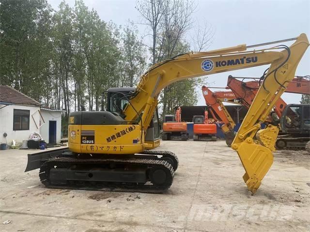 Komatsu PC128US Beltegraver