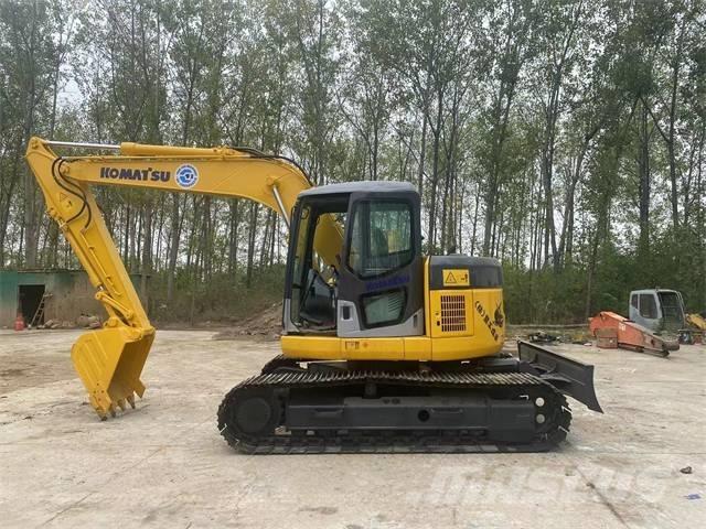Komatsu PC128US Beltegraver