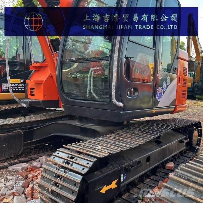 Hitachi ZX 135 Beltegraver