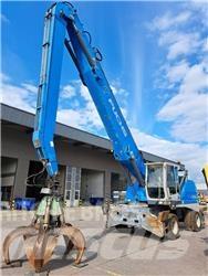 Fuchs MHL350E + Polyp Gravemaskiner for avfallshåndtering