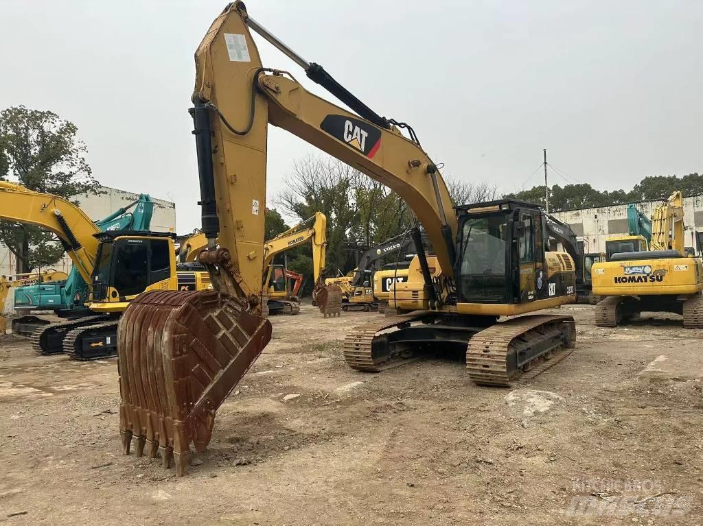 CAT 323D Beltegraver