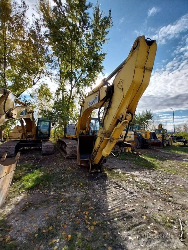 New Holland E 485 Beltegraver