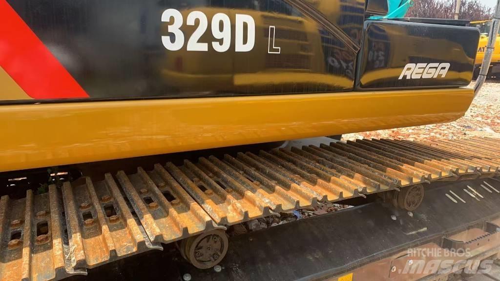 CAT 329 Beltegraver
