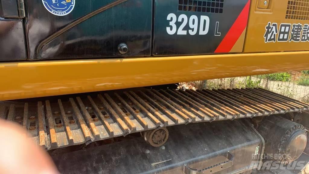 CAT 329 Beltegraver