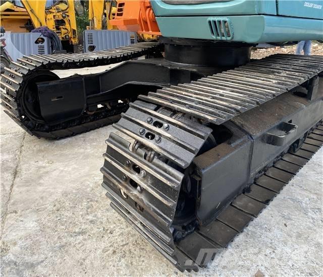 Hitachi EX120 Beltegraver