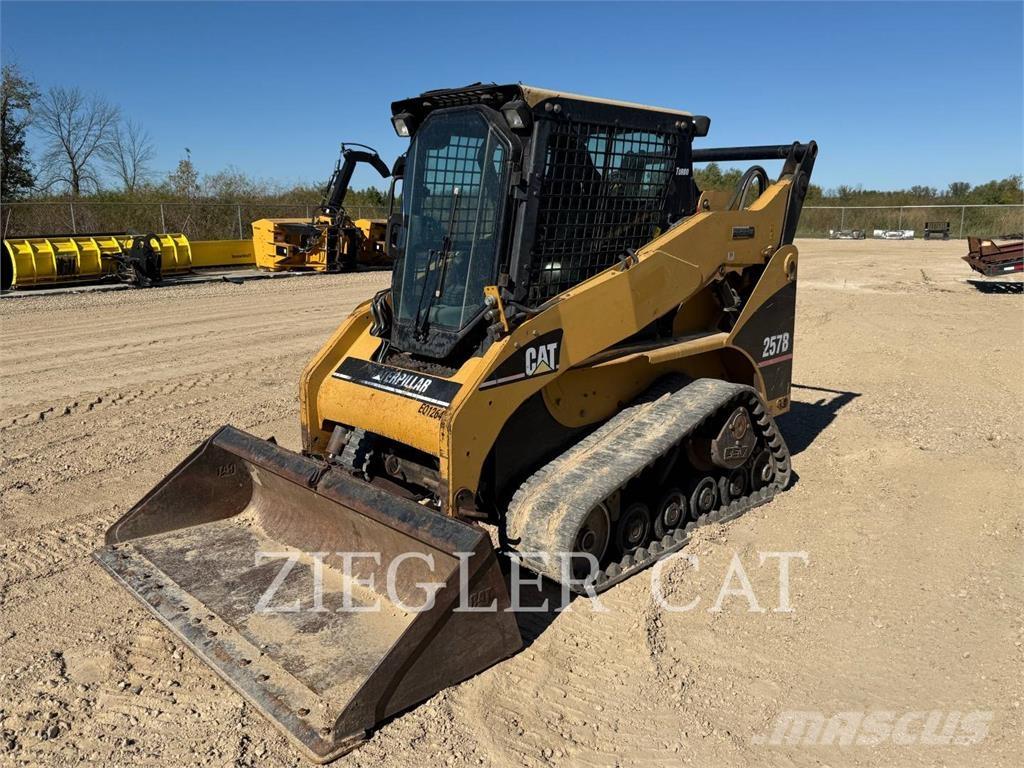 CAT 257B Beltelastere