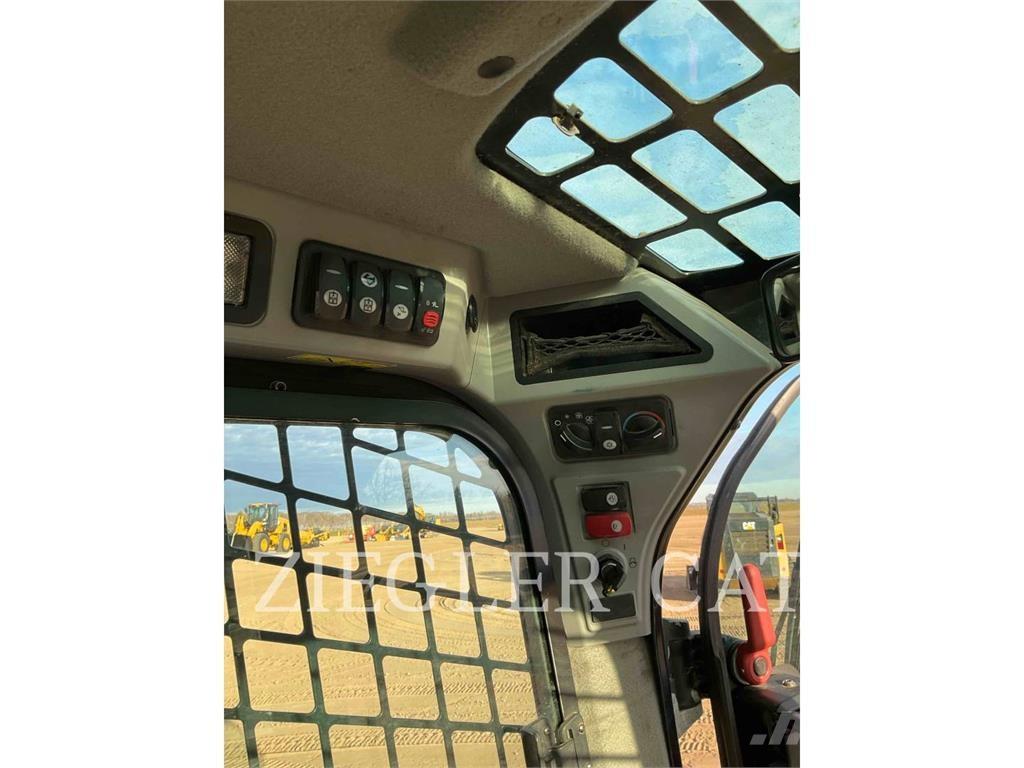 CAT 257D Beltelastere