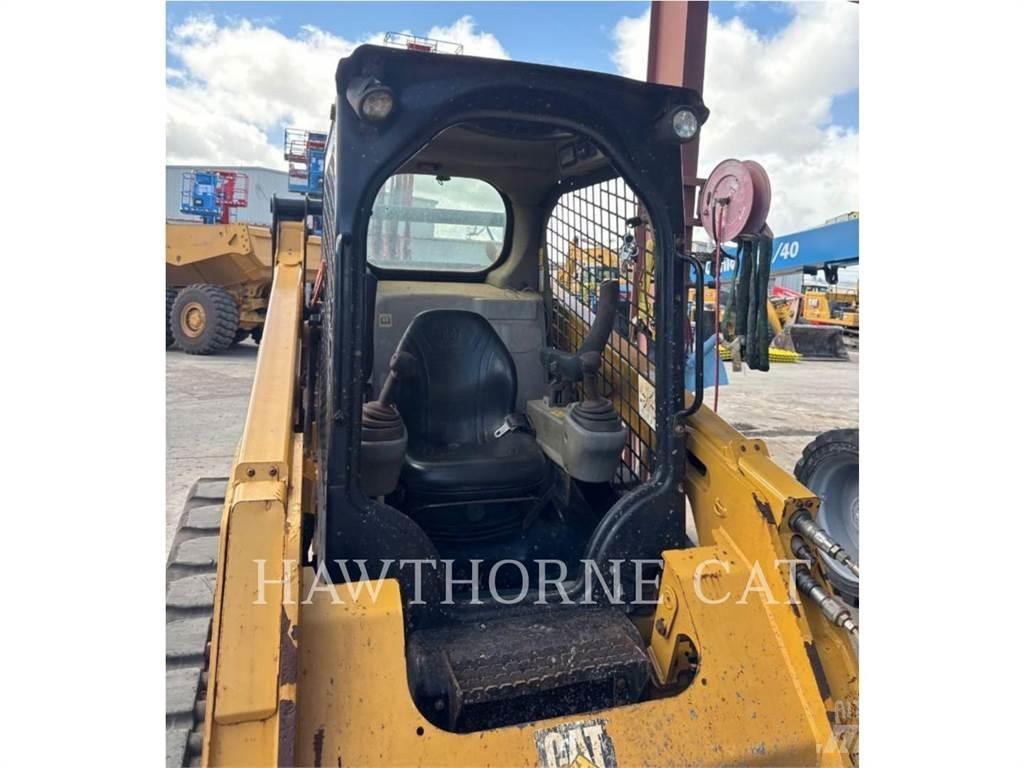 CAT 259D Beltelastere