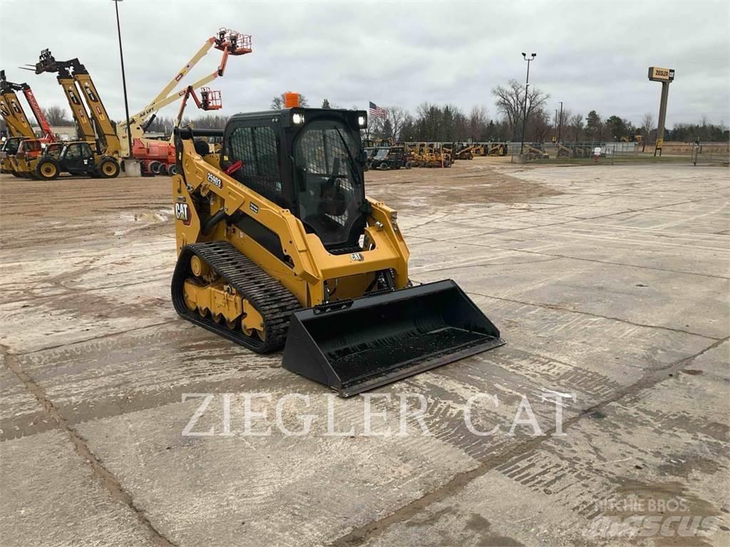 CAT 259D3 Beltelastere