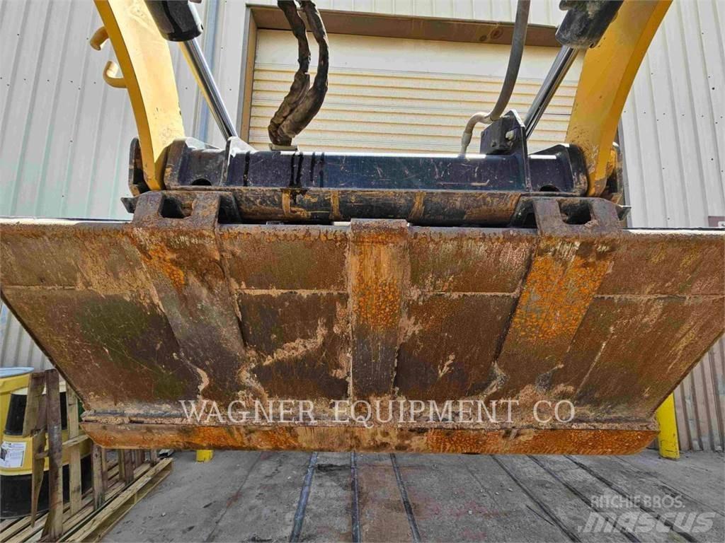 CAT 259D3 Beltelastere