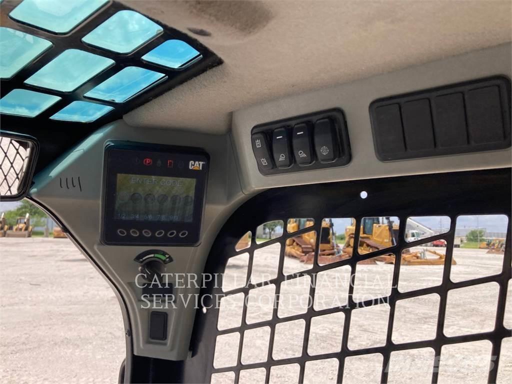 CAT 259D3 Beltelastere